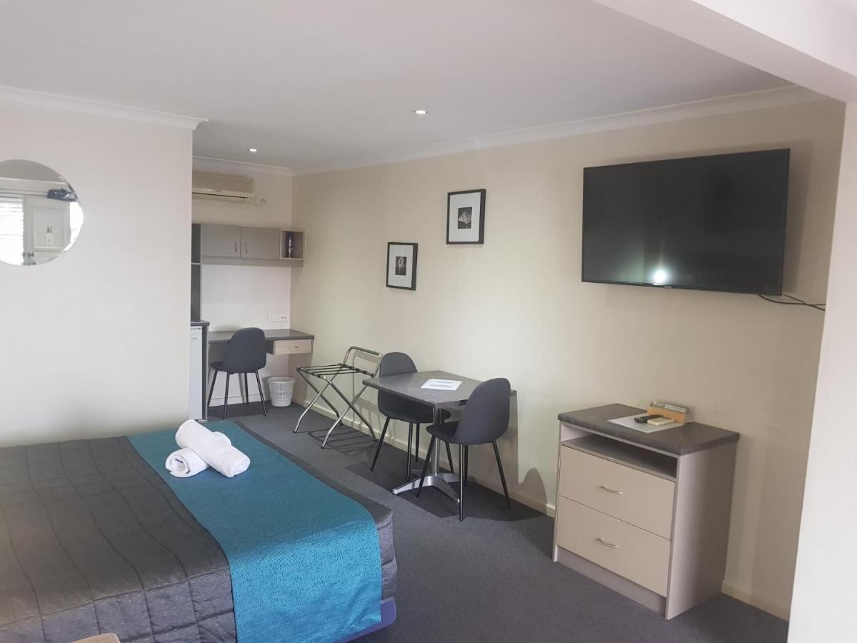 Caravilla Motor Inn Taree Extérieur photo